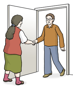 Eine Person kommt durch eine Tür. Die Person wird von einer anderen Person begrüßt.